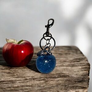 Dazzling Blue Apple Keychain with Silver Leaf